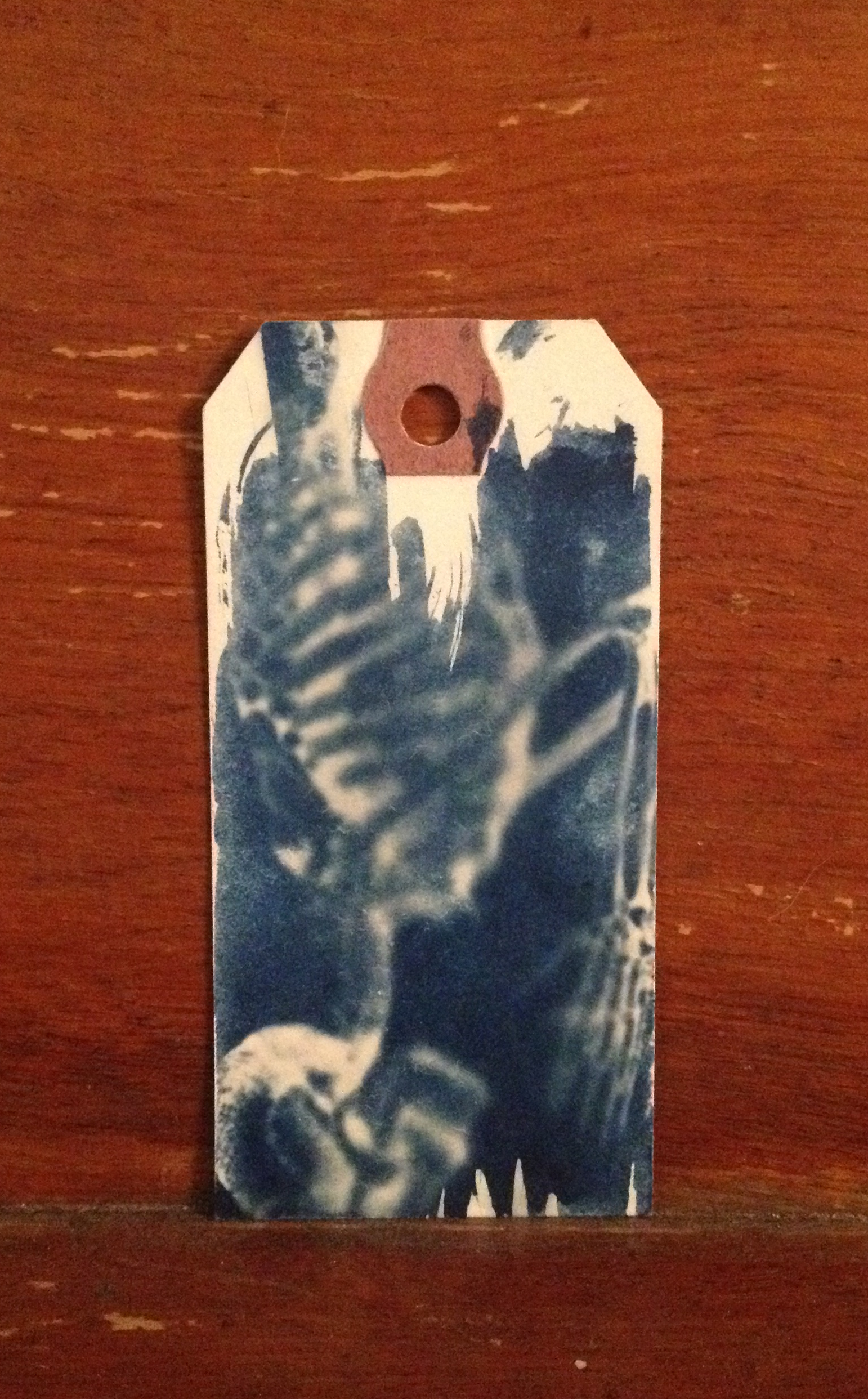  cyanotype on found paper. 1.5 x 3"  