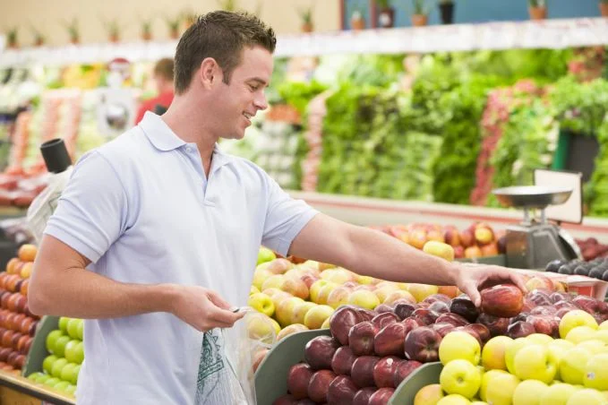 Man shopping for apples.jpg