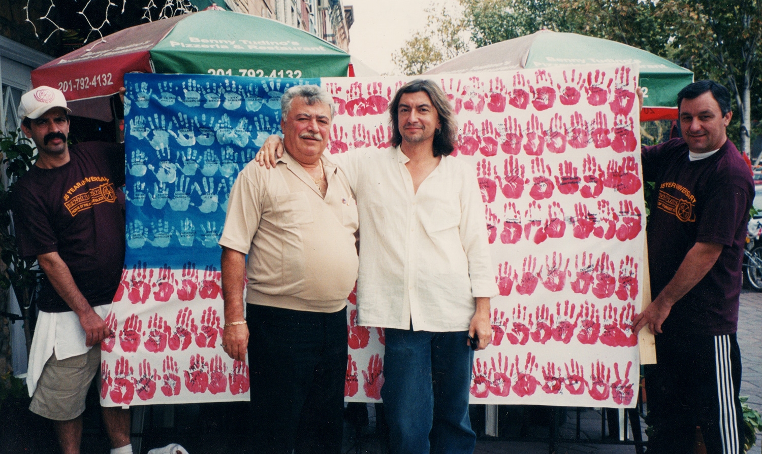Benny Tudino and I with the second handprint flag I made and sent to Rome, Georgia as a thank-you for the one they sent to Hoboken.