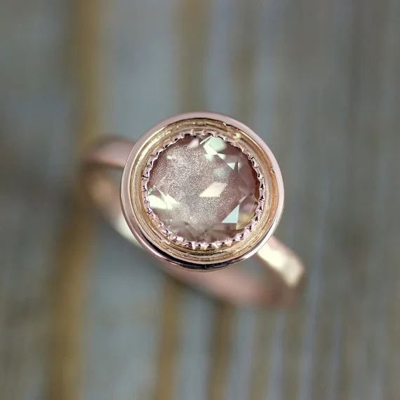 Oregon Sunstone 8mm Halo 14k Pink.jpg
