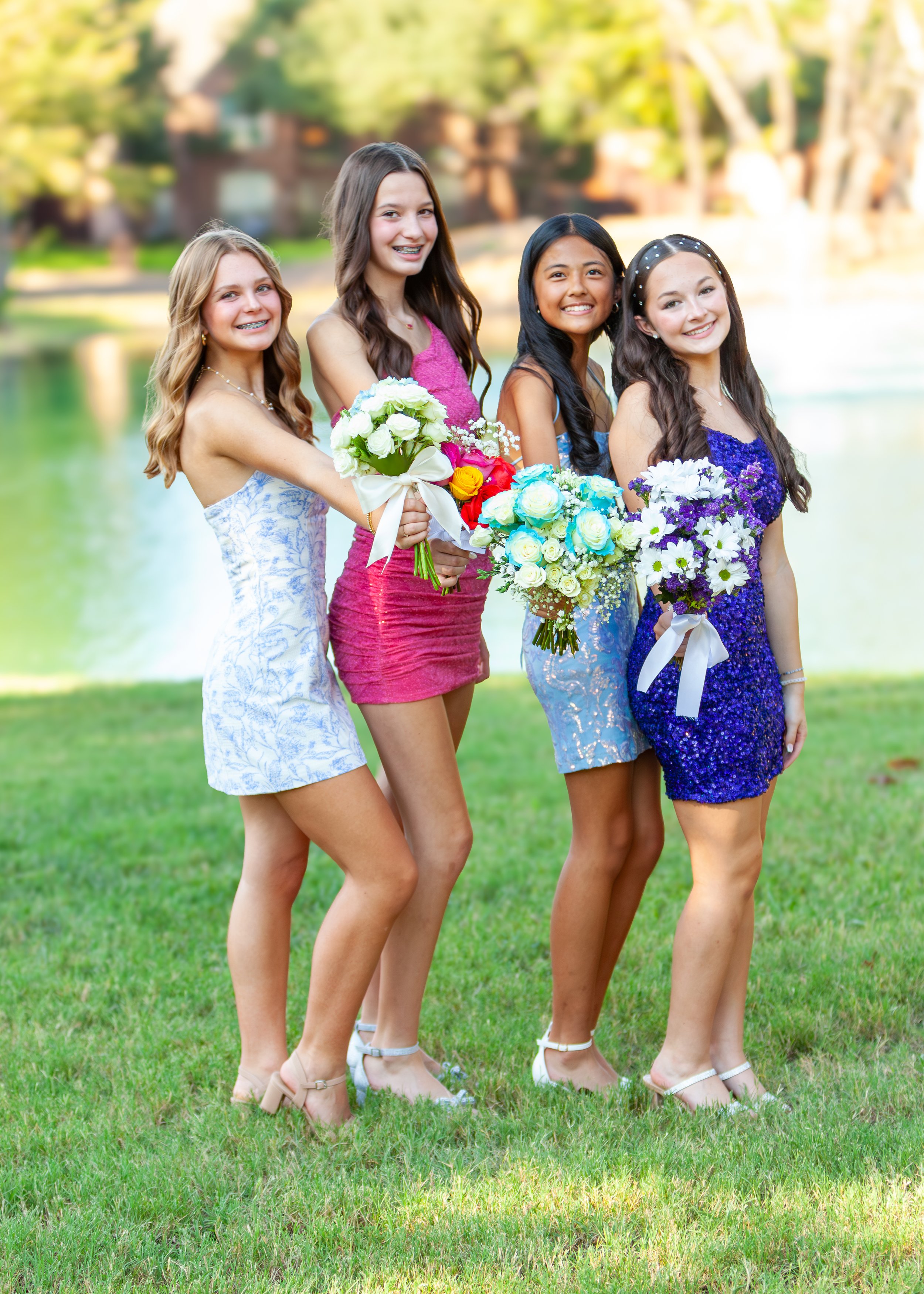 4 girls flowers 1 HOCO 2024 Freshman.jpg