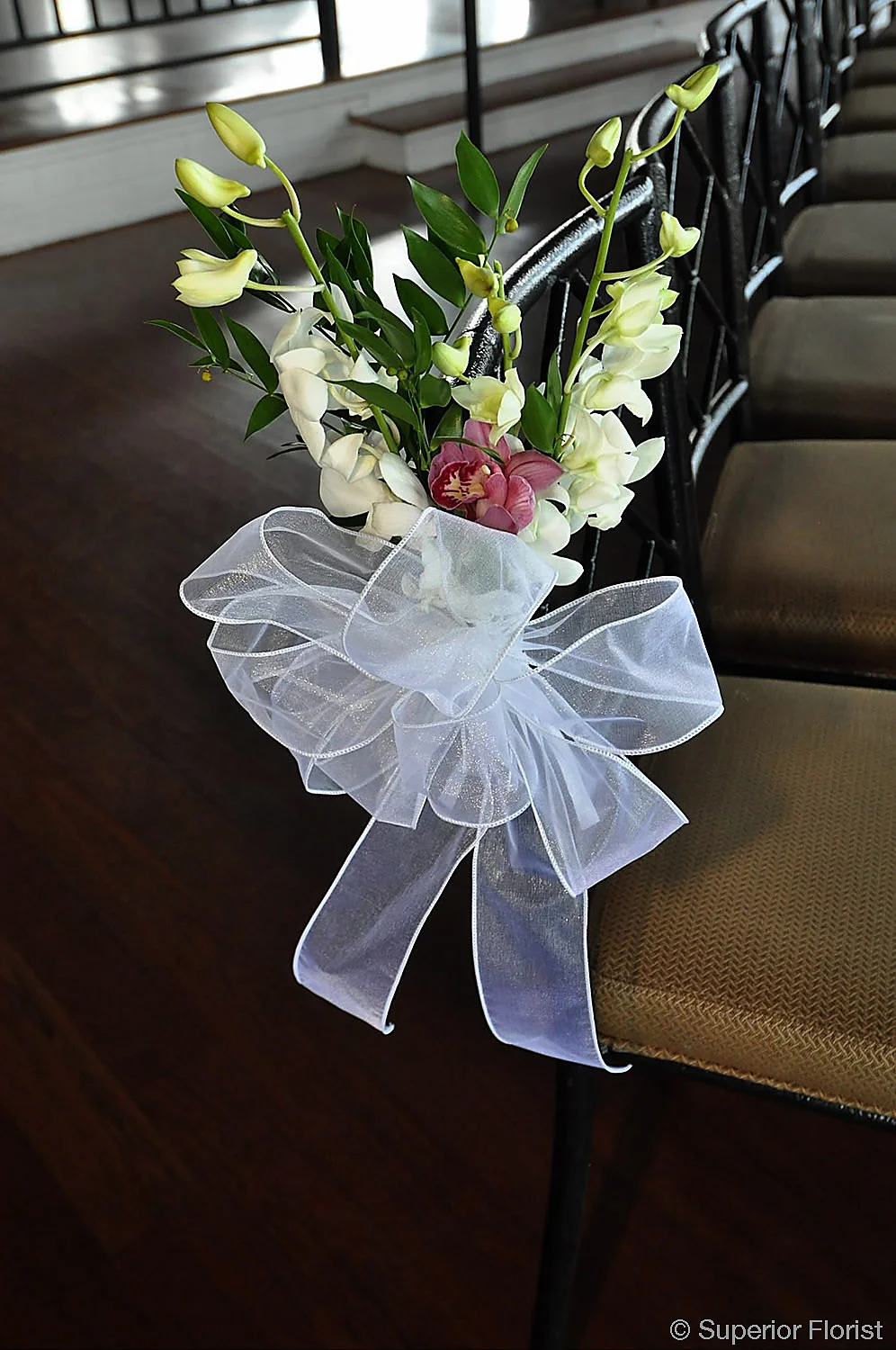  Superior Florist – Wedding Décor:  White and pink aisle decoration. 
