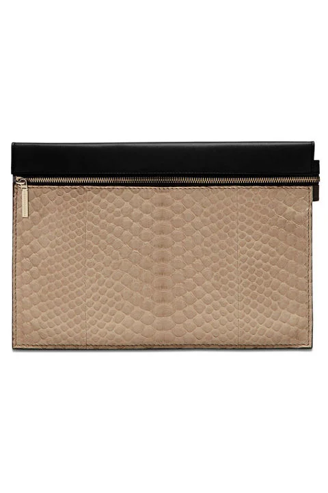 Victoria Beckham pouch, $995, victoriabeckham.com . COURTESY VICTORIA BECKHAM