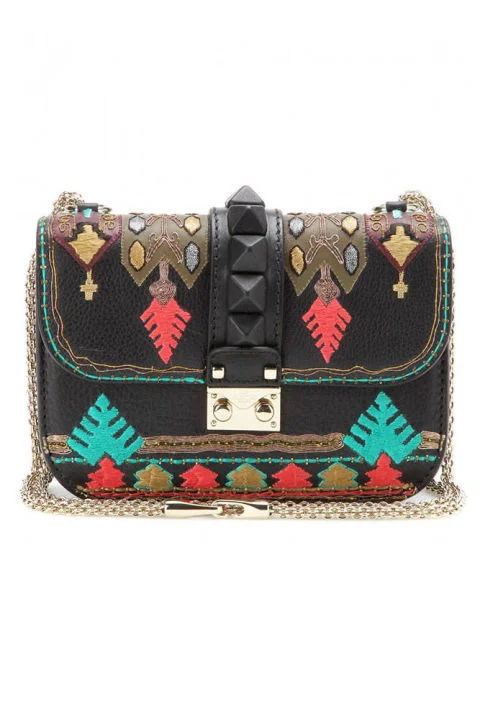Valentino clutch, $3,095, mytheresa.com . COURTESY MY THERESA