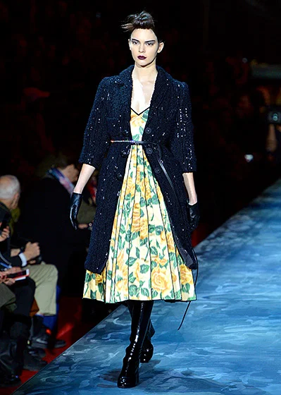 Credit: Slaven Vlasic/Getty Images Ghost protocol! Kris Jenner's second-youngest daughter strutted her stuff in a retro, rose-print ensemble on Feb. 19, in NYC. However, the real focus was on her washed-out skin, teamed with a modern take on a '50s pompadour.