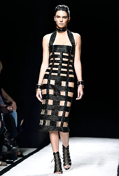  Credit: Pascal Le Segretain/Getty Images Doesn't get any hotter than this! Jenner sizzled in a black Balmain dress with boxy cutouts in Paris on Sept. 25.
