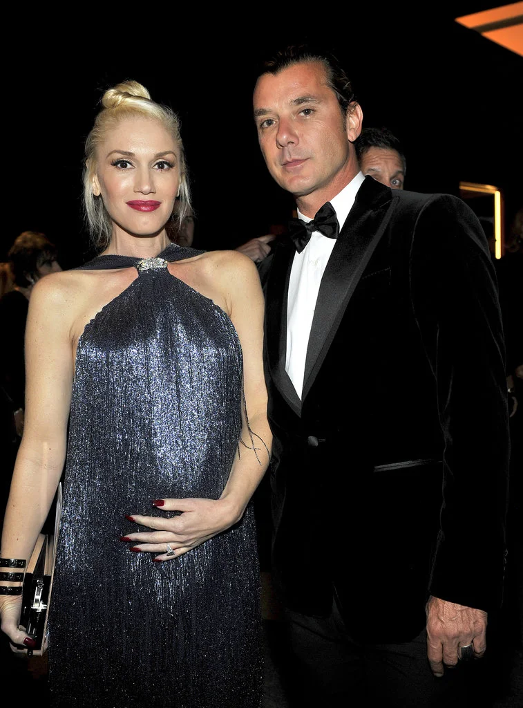 Image Source: Getty / Donato Sardella Gwen Goes Glam Cradling her baby bump at the Wallis Annenberg Center For the Performing Arts Inaugural Gala late last year, Gwen Stefani glowed in a fringed, floor-length Ferragamo gown, her signature red lip, and baby bump number three.