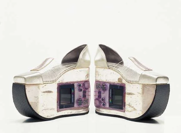 6. If you ever get bored when wearing these platforms, you can whip the Gameboy out of them and start playing. They look edgier and more futuristic than the ‘Back To The Future’ shoes, and we want them ASAP.