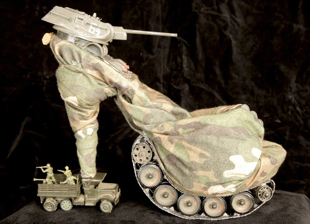 9. The detail that went into this stiletto complete with a full army and tanks deserves an award. It’s all your GI Joe/GI Jane fantasies come true, made with vintage camouflage army clothing, and war toys.