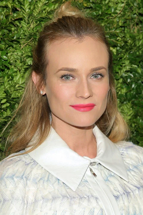Who: Olivia Wilde What: A Delicate Hair Accessory How-To: Wilde added a dainty element of surprise to her asymmetrical hairstyle in the form of a bungee that held her hair flatly in place for a sleek, seamless flow down the back. For an invisible transition, match the bungee to your hair color. Editor's Pick: Revlon Super Lustrous Lipstick in Certainly Red, $8, ulta.com . GETTY