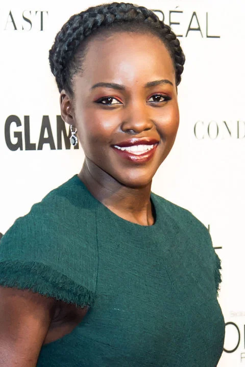 Who: Lupita Nyong'o What: Garnet Tones How-To: "Red eyeshadow is intimidating," admits the actress's makeup artist Nick Barose," but it's all in the color, texture and balance." Keep the boldest impact at the inner corners for a twist on traditional illuminator, then fade the shadow out to a soft wash across the lids and complement the eyes (without being too matchy-matchy) with a shimmery rust lip color.
