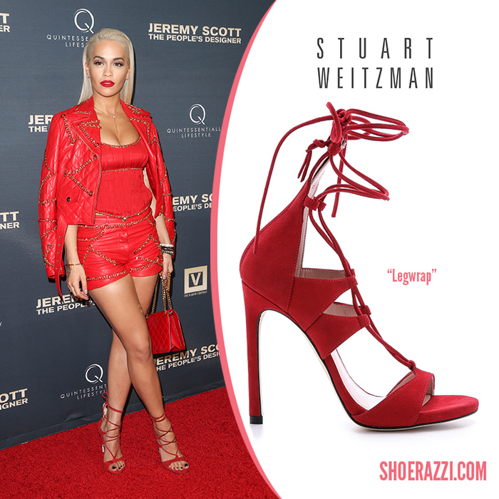 Credit: PR Photos Rita Ora wore Stuart Weitzman Legwrap sandals to “Jeremy Scott: The People’s Designer” premiere held at the TCL Chinese Theatre in Hollywood. These gladiator inspired heels are from the Fall 2015 collection featuring red suede, laces which entwine the leg plus a 110mm heel. Legwrap is available at Shopbop , Forward by Elyse Walker , Zappos , Saks Fifth Avenue , Neiman Marcus and Stuart Weitzman . Outfit details : Moschino Resort 2016 red leather chain embellished jacket & shorts, plus a Moschino quilted shoulder bag . Check out more shoes spotted on Rita .