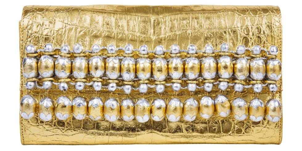Nancy Gonzalez clutch, $3,025, Saks Fifth Avenue, 877-551-7257. STUDIO D