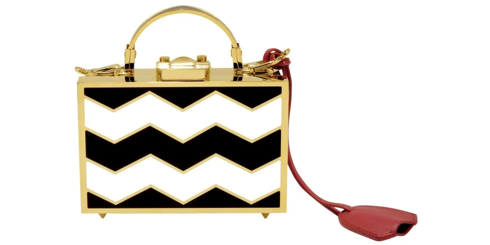Mark Cross clutch, $4,500, net-a-porter.com . STUDIO D