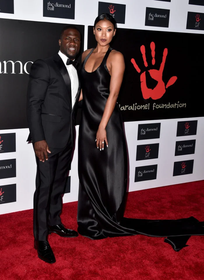 Kevin Hart and Eniko Parrish were quite the stylish duo in a tux and black silk gown with a cascading train, respectively. They’re a great-looking couple!