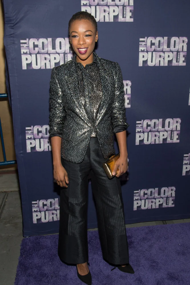 Samira Wiley was suited up for the evening in a glossy animal print blazer, matching button-front shirt, and black textured trousers.