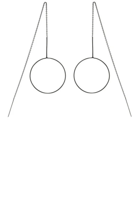 Maria Black earrings, $120, maria-black.com .