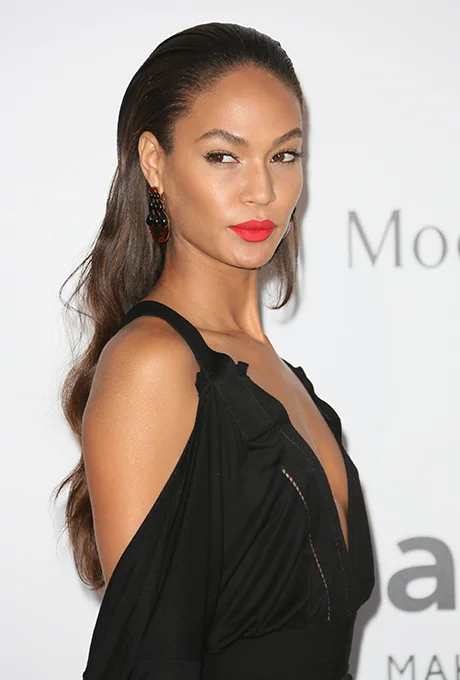 Joan Smalls It doesn't get sexier than Joan's slicked-back hairstyle, sharp brows, and punchy lip. Photo: Getty Images