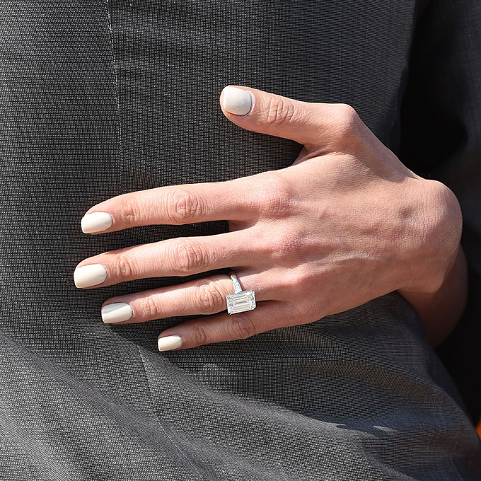 Amal Alamuddin-Clooney's Engagement Ring George Clooney's retreat from eternal bachelorhood shocked the world, but his gorgeous and incredibly smart new wife seems to be his perfect match. To solidify their union, Clooney gave Amal a huge emerald-cut diamond engagement ring. Photo: Getty Images