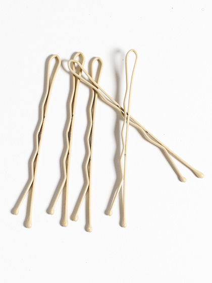 BOBBY PINS Here's the key difference between bobby pins and bridal bobby pins: The former are meant to be hidden; the latter are the main event. Get your hands on some gold, silver, or white pins (or spray-paint your usual set) and slip them into the hair in a chevron shape. Insta-cool.