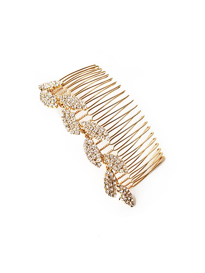 ANTIQUE COMB This is a really good time to use your "something old" card. But if you don't have an antique comb you love, fake it. Jennifer Behr, Colette Malouf, and Lelet NY (shown here) have great options. Slip them into the crease of a French twist, a low chignon, or in the knot of a half-up style.