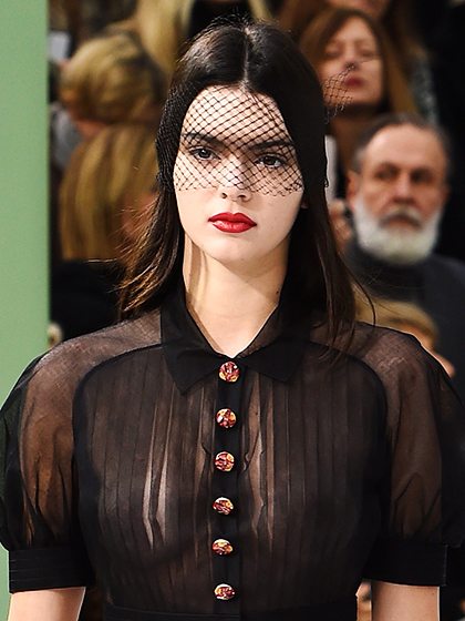 VIOLETTE We don't mean in a mourning Sicilian-grandmother way. We mean in a fashion runway (Giambattista Valli and Chanel) kind of way. Skip the boxy birdcage or oversize fascinator and go with a violette. They're sexy and demure—and won't poke anyone in the eye. Jennifer Behr makes beautiful ones, or you can get all crafty and make your own with lace and a headband.