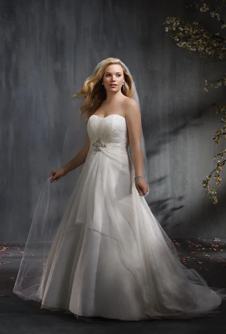  Photo: Courtesy of Alfred Angelo Style 2335, soft net over satin wedding dress with rhinestones, crystal beading, pearls, sequins, and metallic accents, $849, Alfred Angelo See more Alfred Angelo wedding dresses.