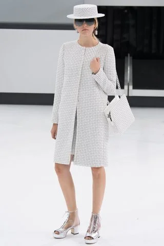 Chanel The ultimate in ladylike glamour for the big day? A complete look from the French house with coordinating chapeau and satchel, bien sûr . Photo: Indigitalimages.com
