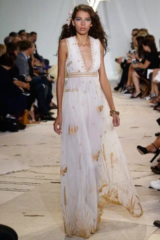 Diane von Furstenberg This free-flowing frock with gilded butterflies flutters elegantly in all settings. Photo: Indigitalimages.com