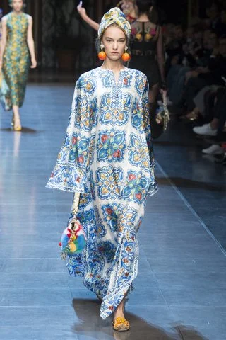 Dolce & Gabbana A punchy, printed caftan delivers a contemporary take on Talitha Getty style. Photo: Indigitalimages.com
