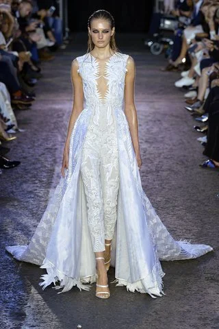 Julien Macdonald Make an entrance and an exit to remember in this jumpsuit ensemble with built-in train. Photo: Indigitalimages.com