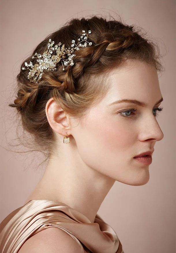 BHLDN Silvestre Comb ($180, bhldn.com ) Both sweetly bohemian and classically romantic, this large Swarovski crystal comb is the perfect accent to a loose braided updo or soft waves