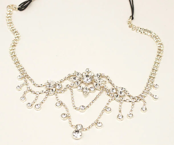 Aruna Rhinestone Bridal Headpiece ($96, haircomesthebride.com ) Indulge your attention-grabbing dramatic side (why not?) with this rhinestone headpiece, which drapes over your forehead for a royalty-esque look. Read more: http://dailymakeover.com/wedding-headpieces/#ixzz3oGOShLSx