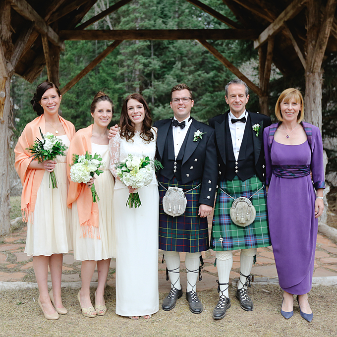 Karine and Carl's remote wedding in the Colorado Rockies featured refined rustic details, fur shrugs and kilts for all male guests. Karine's mother celebrated the romantic mountainside wedding in a purple gown with tartan detailing to match the kilts. See more purple mother-of-the-bride dresses. View more photos from Karine and Carl's wedding. Photo: Laura Murray Photography