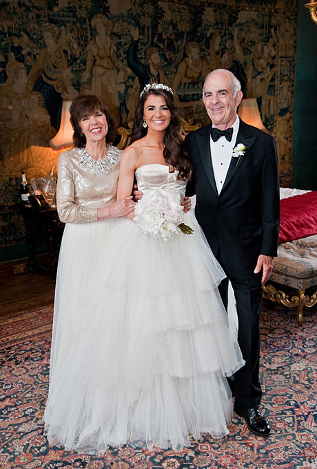 For her formal wedding in the English countryside to fiancé Michael, bride Lauren looked to the Royal Wedding for inspiration. A crystal headpiece and tulle wedding dress helped her fit that vision, while she fashioned her mother's elegant gold sequin gown to look both regal and stylish. See more gold mother-of-the-bride dresses. View more photos from Lauren and Michael's wedding. Photo: Hayley Bray