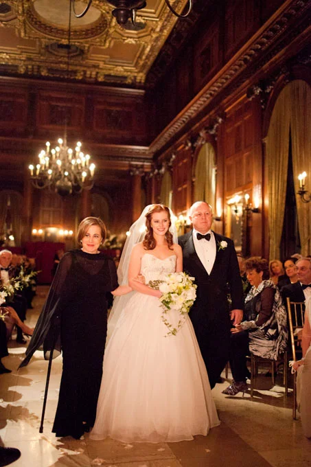 Sarah and Scott held a timeless fall wedding at the opulent University Club in New York City. Sarah's mother's formal black dress received dramatic flair from the accompanying sheer shawl. See more black mother-of-the-bride dresses. View more photos from Sarah and Scott's wedding. Photo: Jason Walker and Shannen Norman of Ira Lippke Studios