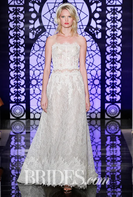 Chantilly lace strapless wedding dress with cut-out waist, Reem Acra Photo: Luca Tombolini and Alberto Maddaloni / Indigitalimages.com