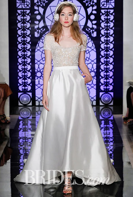 Embroidered illusion wedding dress with silk gazar high-low skirt, Reem Acra Photo: Luca Tombolini and Alberto Maddaloni / Indigitalimages.com