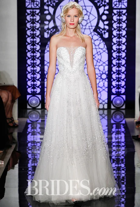 Embroidered illusion wedding dress with plunging neckline, Reem Acra Photo: Luca Tombolini and Alberto Maddaloni / Indigitalimages.com