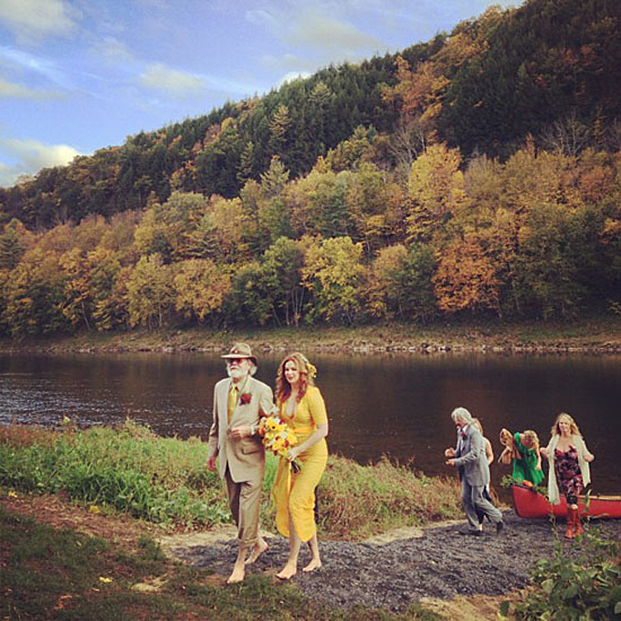 Photo: Questlove via Twitter Amber Tamblyn Tamblyn and husband David Cross are an offbeat couple, and the dress she wore to their October 2012 wedding exemplifies that: "It was marigold, and it had a train in the back that was cream," Tamblyn told Us Weekly of the frock. "There's nothing really traditional about me." We'd say that's an accurate statement considering she showed up to their wedding in a canoe and exchanged vows in a clearing in the woods.