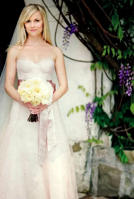 Photos: via Tumblr Reese Witherspoon Hollywood's resident Southern belle looked every bit the sweet Tennessee girl in a custom blush Monique Lhuillier wedding dress when she married Jim Toth in March 2011. Also worth noting: Her bridal gown matched the maid-of-honor dress Lhuillier designed for Witherspoon's daughter Ava.