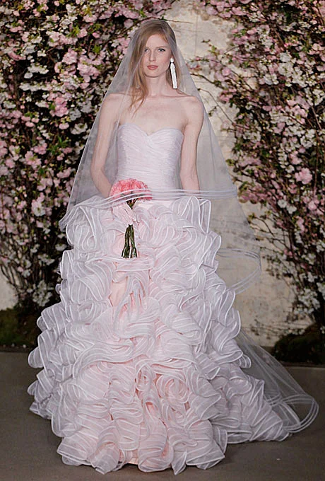 Oscar de la Renta Gown by Oscar de la Renta Browse more Oscar de la Renta wedding dresses. Photo: George Chinsee
