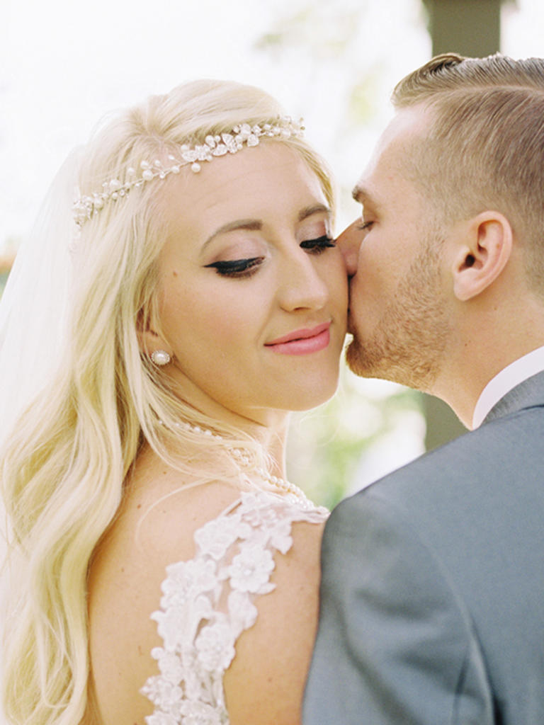 PHOTO BY MARIEL HANNAH PHOTO Pale pink lipstick meets black winged eyeliner for a look that's both dramatic and sweet. From the album A Boho Garden Chic Wedding at Cactus and Tropicals in Draper, Utah