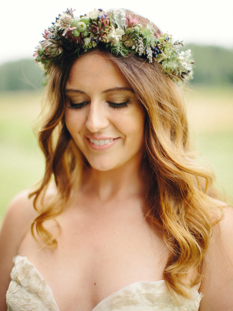PHOTO BY NICOLE HALEY PHOTOGRAPHY To match her crown of greenery and loose waves, this bride went with a wash of shimmery green-gold eye shadow. Finishing with nude lipstick complements her au naturel vibe. From the album A Laid-Back, Bohemian Wedding at Misty Farm in Ann Arbor, Michigan