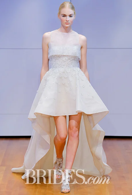 Half ball gown, half mod mini, this take on high-low by Rivini by Rita Vinieris had all the makings of a 1960's romantic comedy in an embroidered dress. Photo: Luca Tombolini and Alberto Maddaloni / Indigitalimages.com