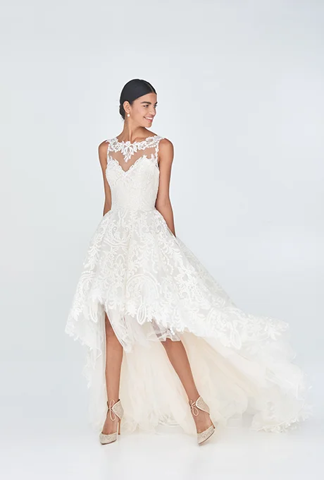 Justin Alexander chose full on drama for this version of high-low. Tulle, lace, and embroidery make a big statement. Photo: Corey Maywalt