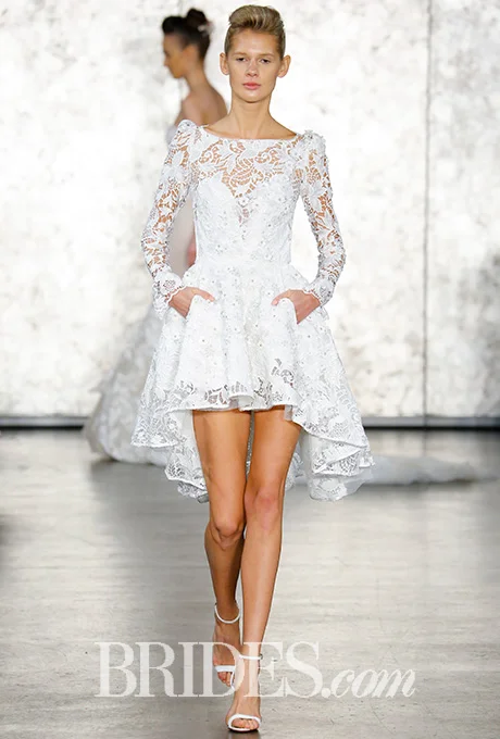 We're pretty sure this is the dress of every courthouse bride's dreams. Inbal Dror's short crochet lace dress is pure high-low perfection. Photo: Luca Tombolini / Indigitalimages.com