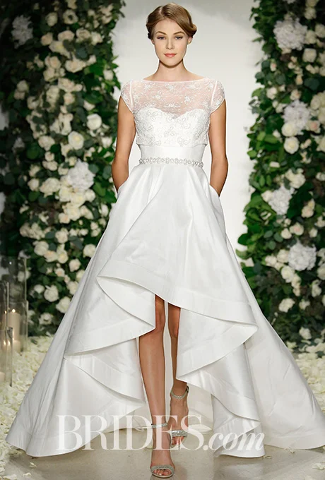 Audrey Hepburn is that you? No, it's just a sweetly classic high-low wedding dress by Delphine Manivet . Photo: Alessandro Garofalo / Indigitalimages.com