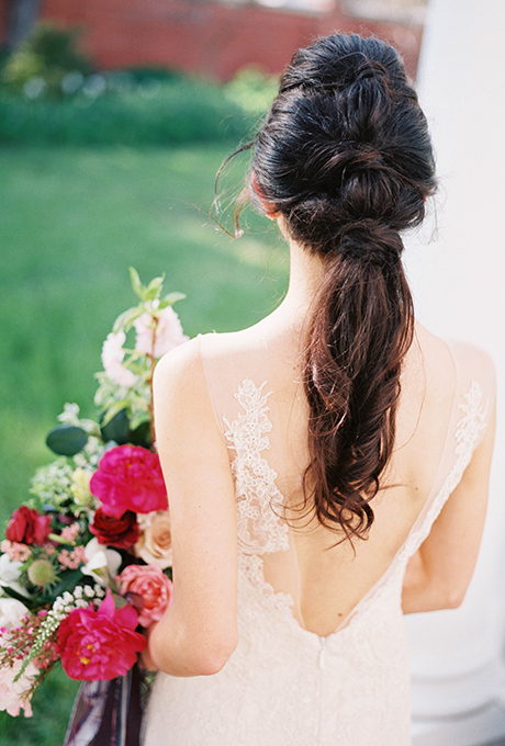 Three is totally better than one — which is exactly why we adore Beauty & the Blush's triple-knotted take on the romantic wrapped pony. Photo: Nicole Berrett Photography