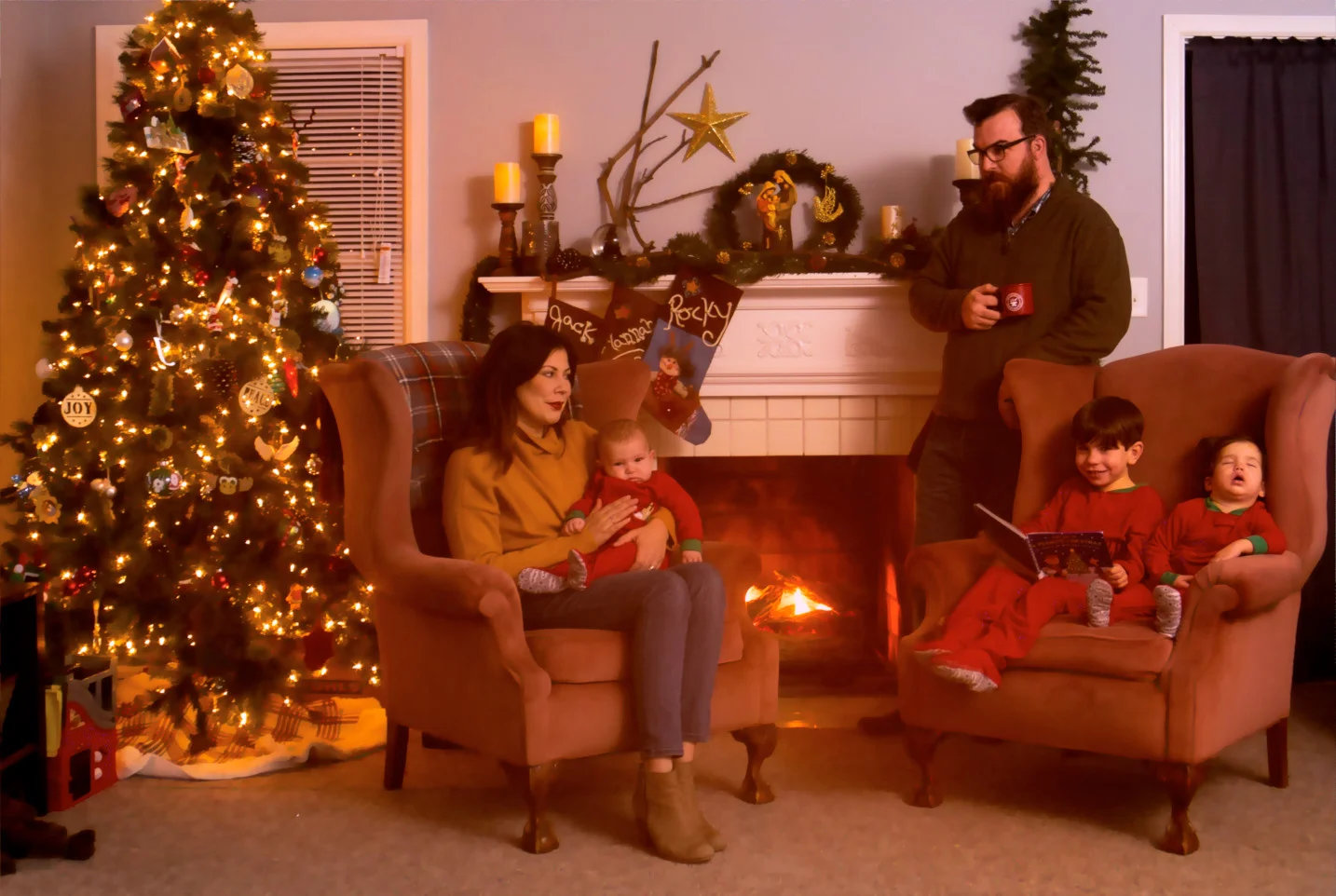 This family Christmas portrait took tremendous planning and testing, all of which was done before the kids ever got in the shot. Even so, we still had to just put Hannah to bed and then bring her out while asleep. Sometimes they just don't want to cooperate. 